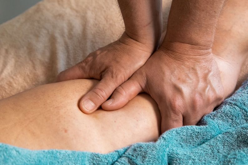 Rubber Compounding - persons feet on blue towel