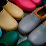 Biobased Rubbers - a group of colorful shoes sitting on top of a floor