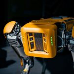 Predictive Maintenance - a close up of a robot that is yellow
