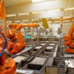 Robotics Factory - a factory filled with lots of orange machines