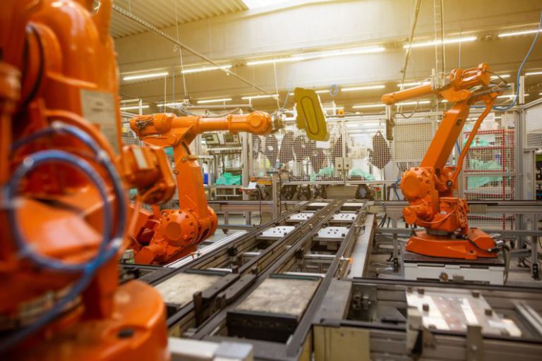 Robotics Factory - a factory filled with lots of orange machines