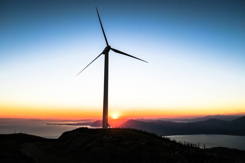 Renewable Utilization - silhouette of wind mill during golden hour
