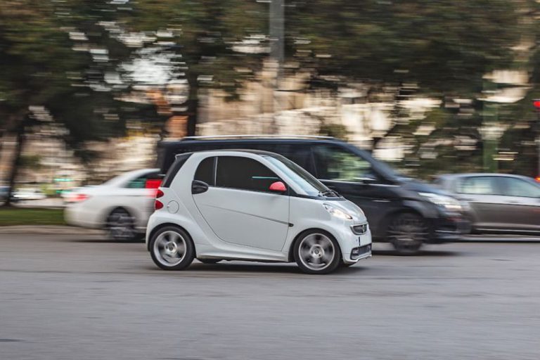 Smart Tires - silver 5 door hatchback on road during daytime