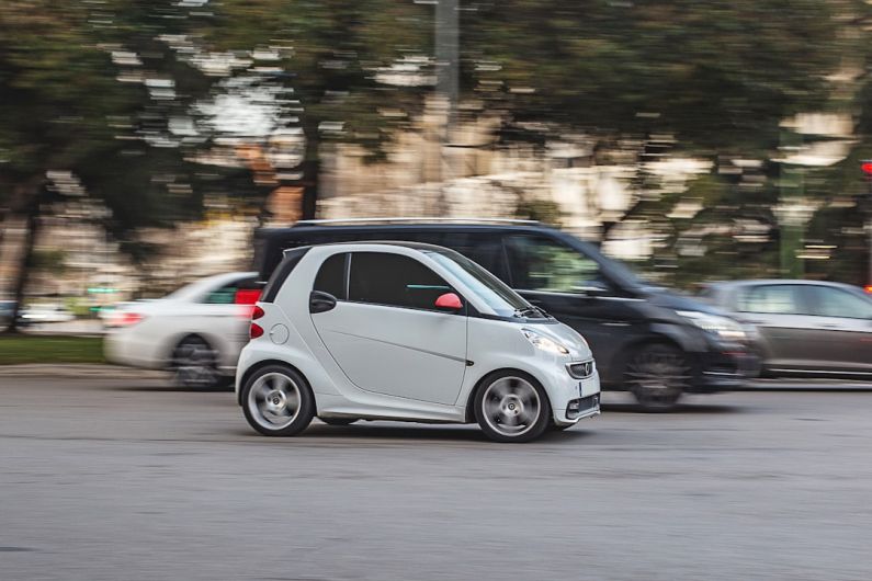 Smart Tires - silver 5 door hatchback on road during daytime