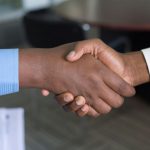 Consumer Role - two person handshaking