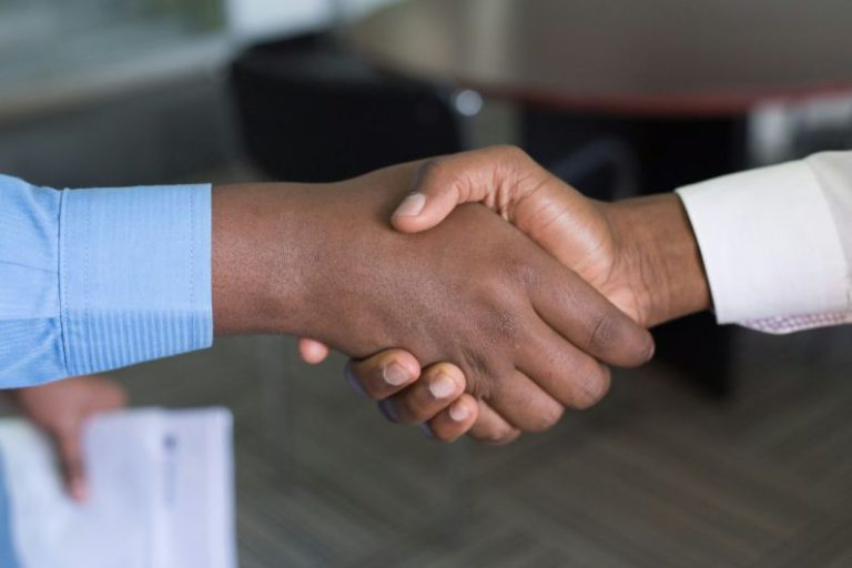 Consumer Role - two person handshaking