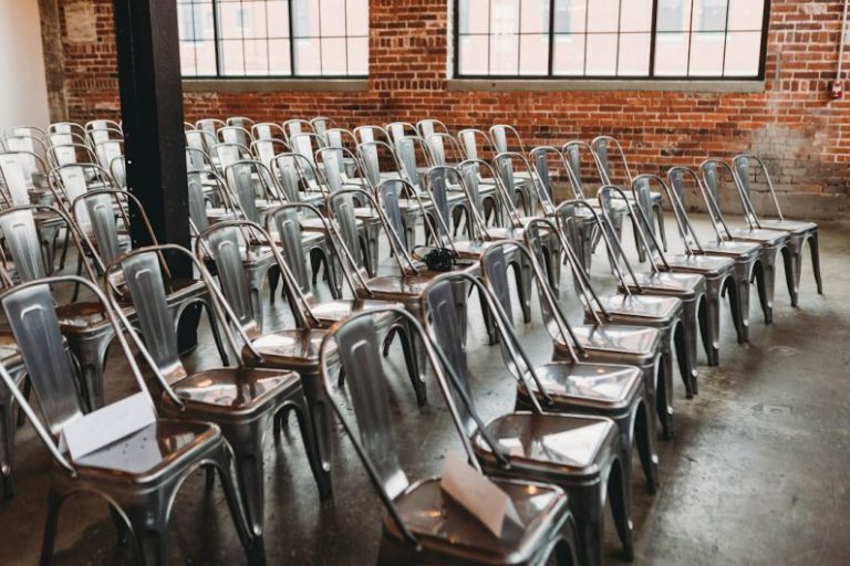 Industry Regulation - a room filled with lots of metal chairs