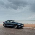 Tire Innovation - black bmw x 6 on beach shore during daytime