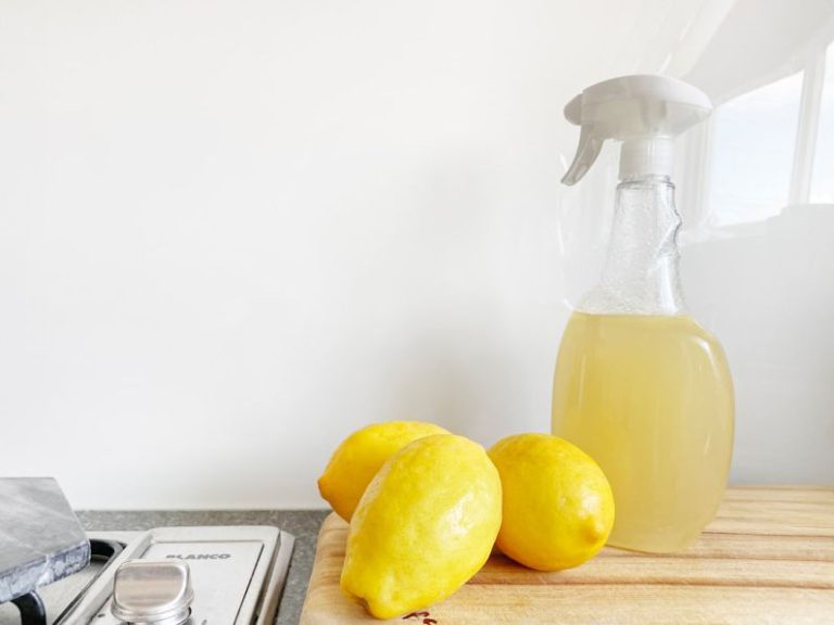 Eco Cleaning - yellow lemon fruit beside clear glass bottle