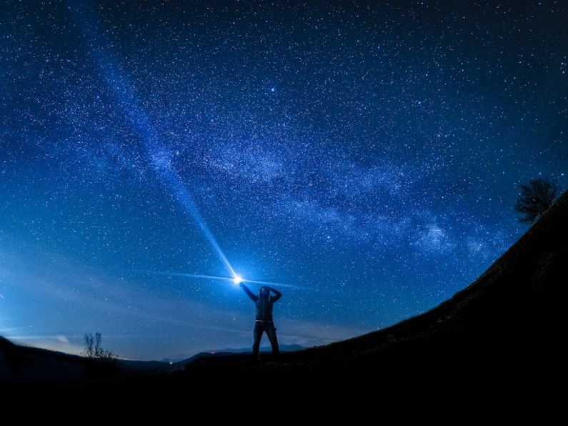 Inspection Guide - silhouette of man holding flashlight