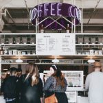 Customer Perception - group of people standing in front of food stall counter