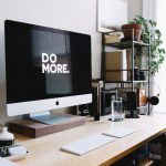 Marketing Strategies - silver iMac with keyboard and trackpad inside room