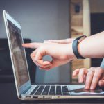 Quality Assurance - person using laptop