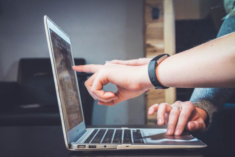 Quality Assurance - person using laptop